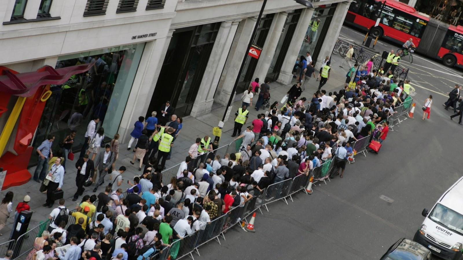 Queue of people waiting to buy iPhone